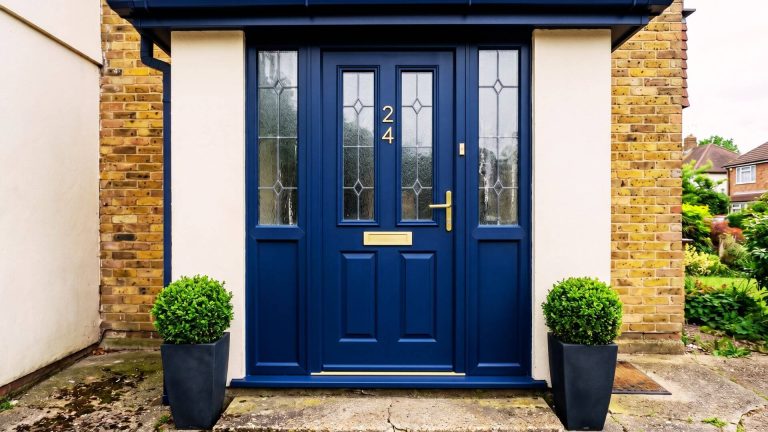 After UPVC door spraying London – composite door sprayed in navy blue matt finish with brushed brass hardware