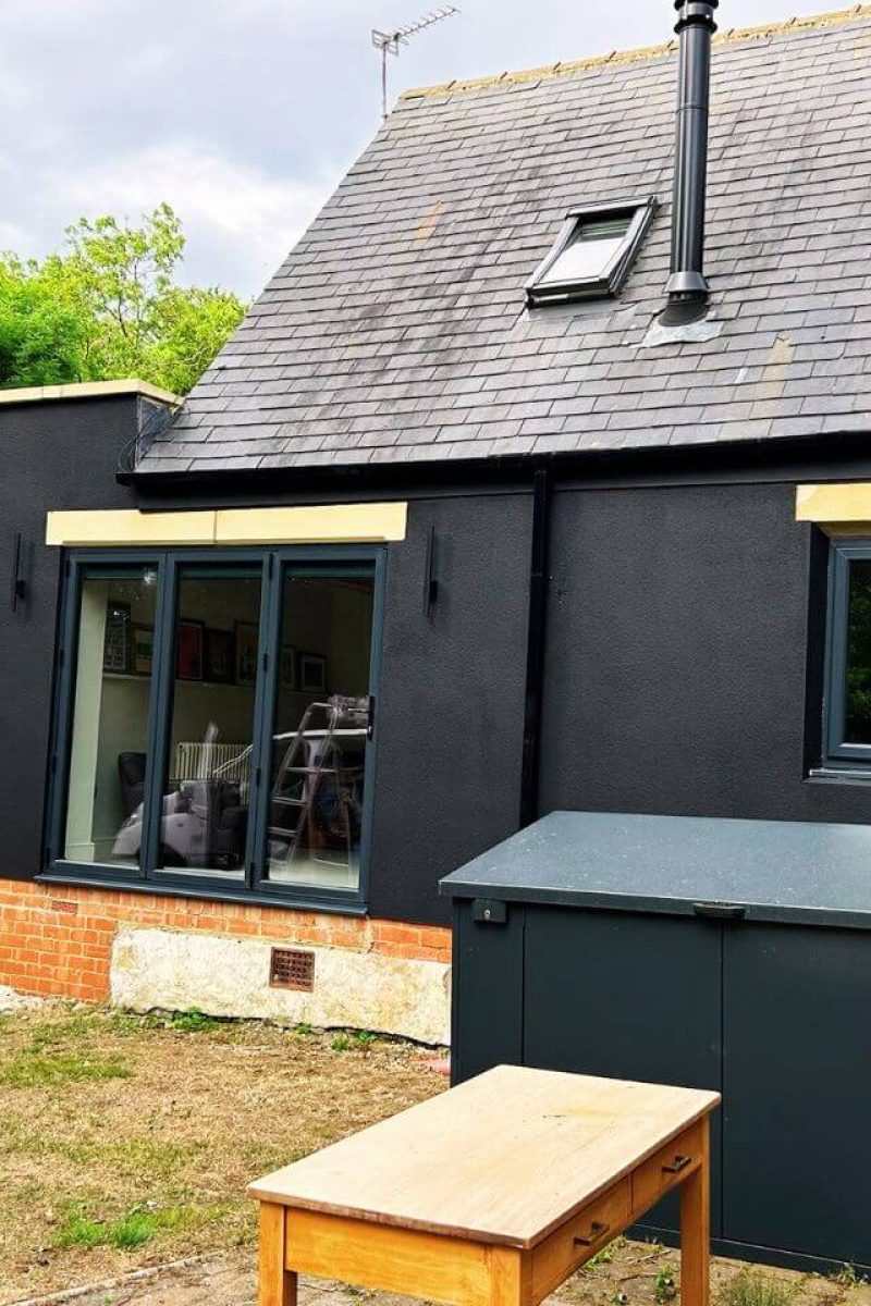 Glossy conservatory interior London – UPVC frames freshly sprayed in black gloss finish