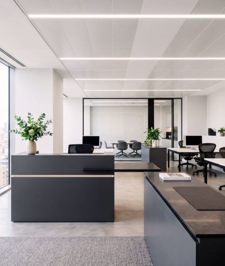 Commercial office spray painting London – open plan office walls sprayed in grey-white matt finish
